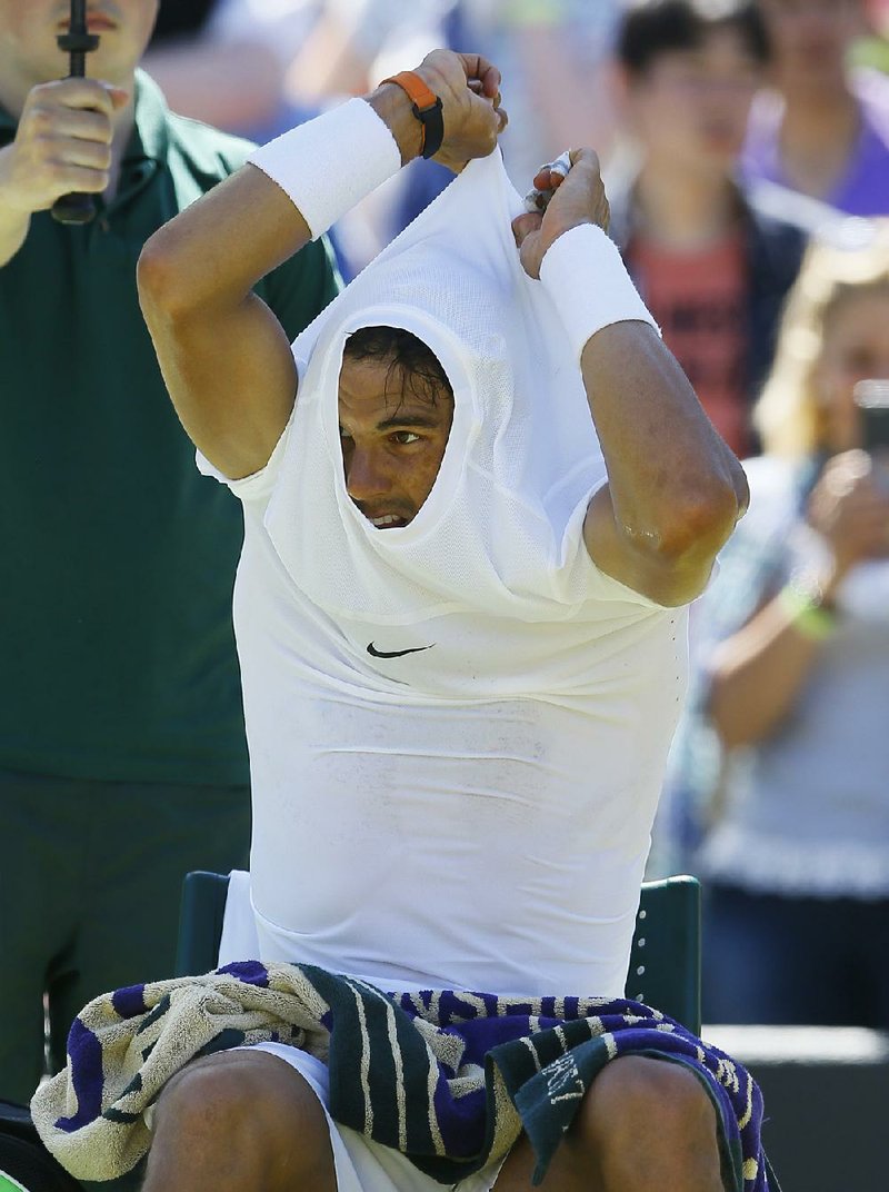 Rafael Nadal of Spain might have sweated enough to change his shirt during his match against Thomaz Bellucci of Brazil on Tuesday at Wimbledon, but he breezed to a 6-4, 6-2, 6-4 victory.