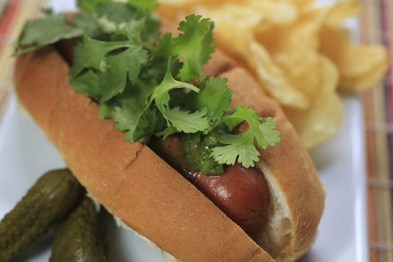Ecuadorian Street Dog is topped with two kinds of salsa and fresh cilantro.