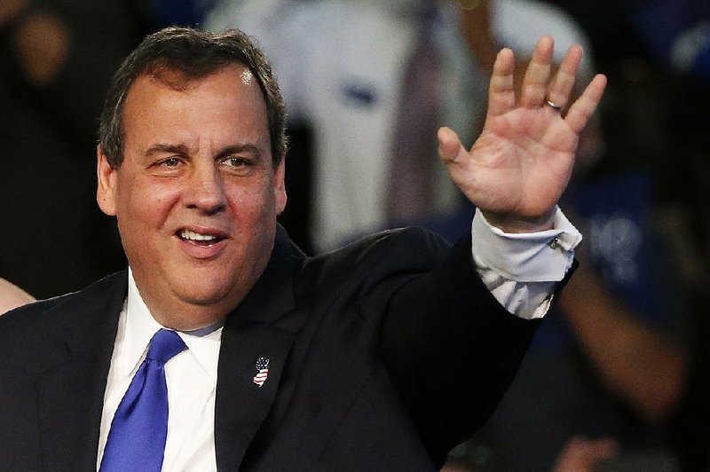New Jersey Gov. Chris Christie waves to supporters during an event where he announced he would seek the Republican nomination for president, Tuesday, June 30, 2015, at Livingston High School in Livingston, N.J.