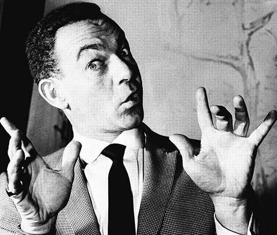 The Associated Press COMIC VARIETY: In this Nov. 16, 1960, file photo, Jack Carter, the American comedian who could turn his hand to singing and dancing as well as cracking jokes, shows an expression from his amazing repertoire at the Pigalle Theater restaurant in London. Carter died of respiratory failure on Sunday at his home in Beverly Hills, Calif. Carter, who turned 93 just four days before his death, was a brash, caustic comic who became a star in early television and sustained a career of more than a half-century in TV, nightclubs, movies and on stage.