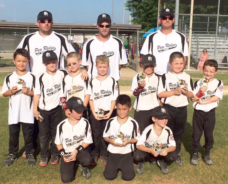 Photograph submitted Pea Ridge 7-year-olds won runner-up in the District championship in Springdale. Players include, front from left: Carson Hodges, Jerrett Pope and Darrin Fletcher; middle, from left: Conner Walker, Braydan Cook, Cooper Mann, Brady Spivey, Rylee McGarrah, Trenton Spillman and Lleyton Anderson; and back, coaches from left: T.J. Pope, Shaun Spillman and Jeff Spivey.