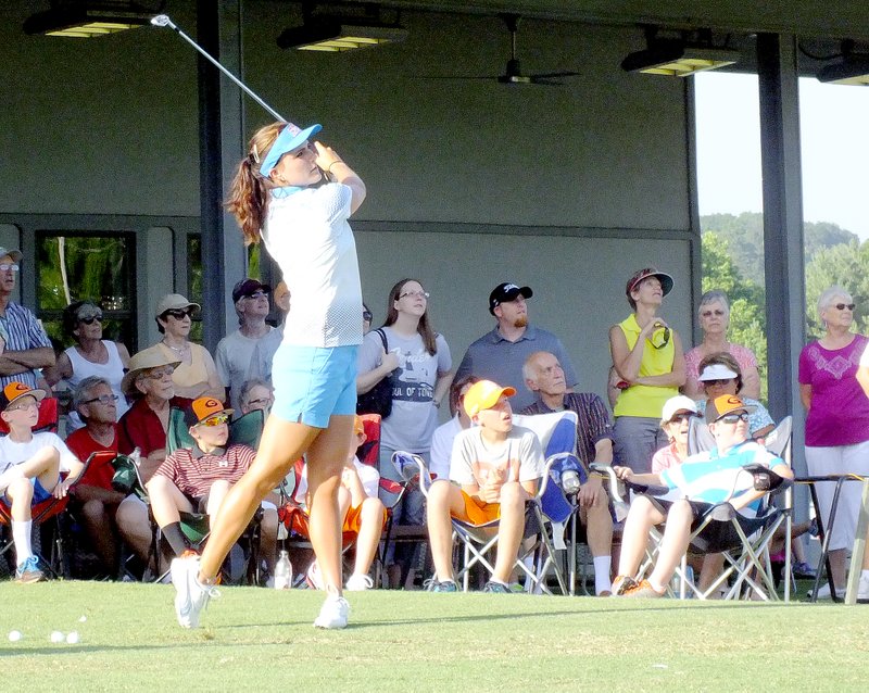 Brandon Howard/The Weekly Vista Spectators watch in awe as professional golfer Lexi Thompson blasts a golf ball deep Wednesday, June 24, at Tanyard Creek Practice Center. Standing six-feet tall, Thompson&#8217;s strength and driving power are signatures of her game.