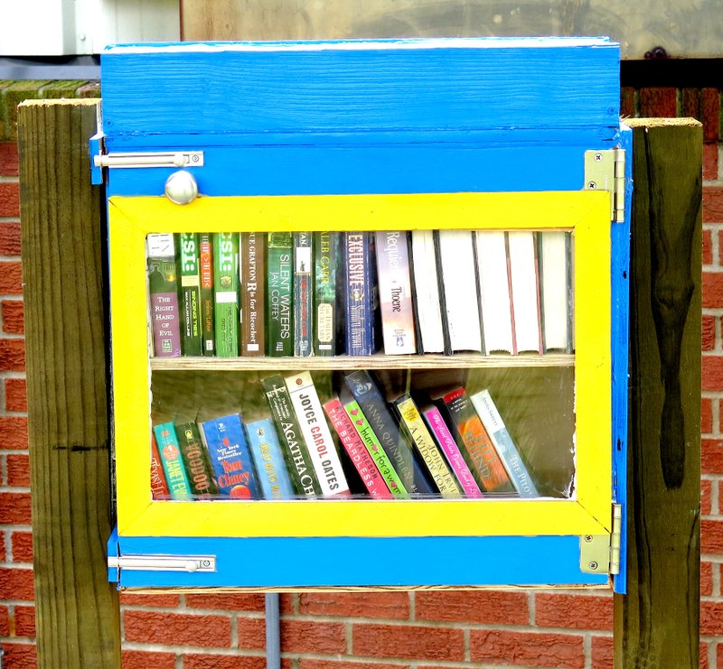 Photo by Mike Eckels The new &#8220;Little Free Library&#8221; box is up and running at Decatur Middle School as of June 26. The unit is located between the band building and middle school.