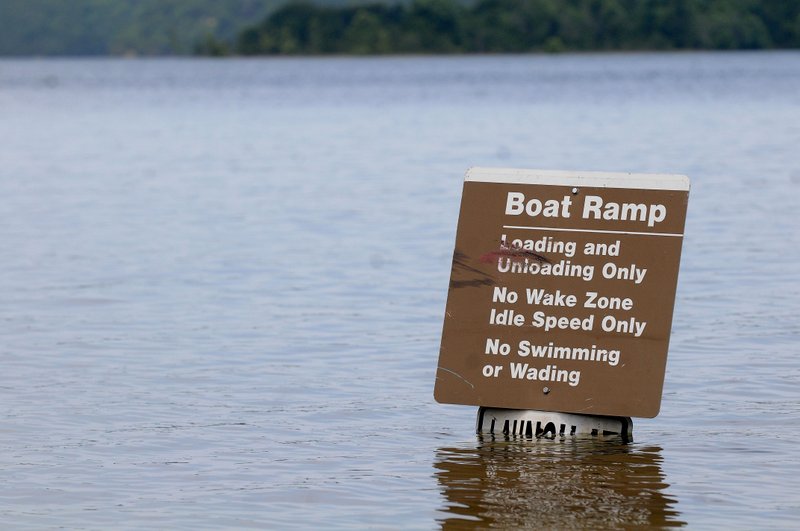 Some launch ramps are submerged by the high lake level, such as the ramp at the Arkansas 12 bridge, seen on Wednesday.