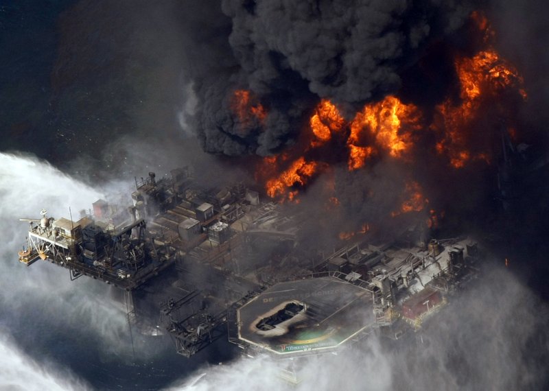 The Deepwater Horizon oil rig burns in the Gulf of Mexico on April, 21, 2010. BP and five Gulf states, Florida, Alabama, Mississippi, Louisiana and Texas, announced an $18.7 billion settlement Thursday over the resulting oil spill.