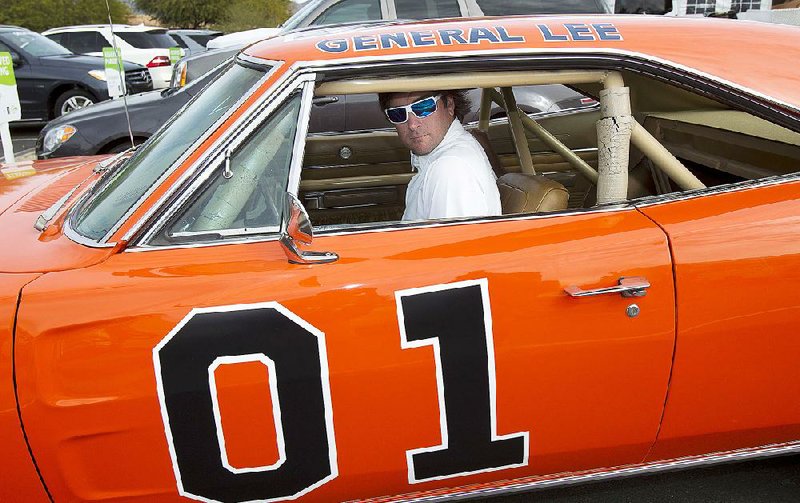 Golfer Bubba Watson says he’s replacing the Confederate flag on the roof of the General Lee, the iconic car from “The Dukes of Hazzard” television series, with an American flag. Watson won the car at auction in 2012.