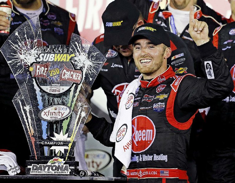 Driver Austin Dillon celebrates in Victory Lane after winning Saturday’s NASCAR Xfinity series race at Daytona International Speedway in Daytona Beach, Fla.