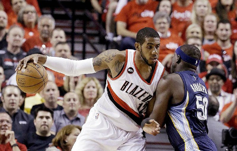 Portland Trail Blazers forward LaMarcus Aldridge (left), who announced Saturday that he was signing with San Antonio, thanked Portland fans in an email sent to The Oregonian columnist John Canzano.