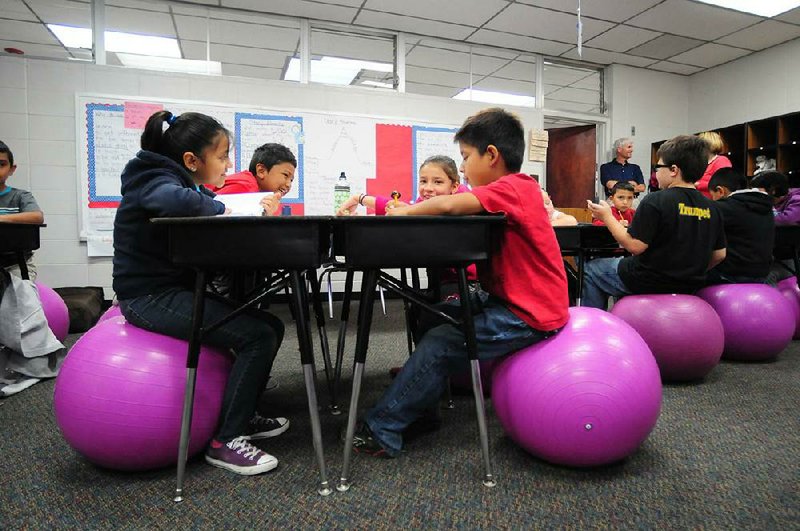 Some Arkansas teachers use active seating of the type in this photo taken at Jones Elementary in Springdale in 2013 to help fidgeters focus. New research suggests it could be especially helpful for children with attention deficit hyperactivity disorder.