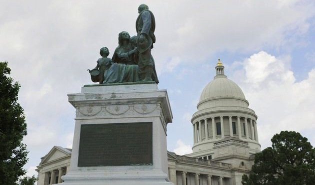 A monument to Confederate women stands on the grounds of the Arkansas state Capitol in Little Rock on Tuesday, July 7, 2015. Statues and memorials could be joined by a monument of a Hindu monkey-faced god turning the Arkansas Capitol into a menagerie after the Legislature's decision to allow a privately funded Ten Commandments display. 