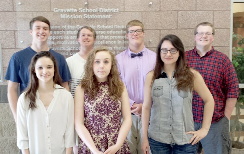 Submitted Photo These seven Gravette DECA Club members were winners in state competition at Little Rock in late March. Pictured are, front row, Ariana Rogers, Victoria Johnson and Miranda Mendoza; back row, Cole Turner, Trey Nunnally, Noah Moore and Chris Smith.