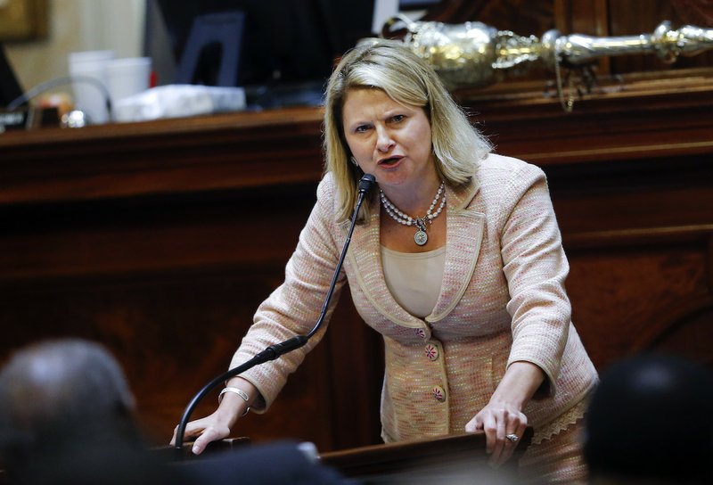 Rep. Jenny Horne, R-Summerville, speaks in favor of taking down the Confederate flag during debate over a Senate bill calling for the flag to be removed from the Capitol grounds, Wednesday, July 8, 2015, in Columbia, S.C. The House is under pressure to act after the state Senate passed its own measure, which is supported by Gov. Nikki Haley. 