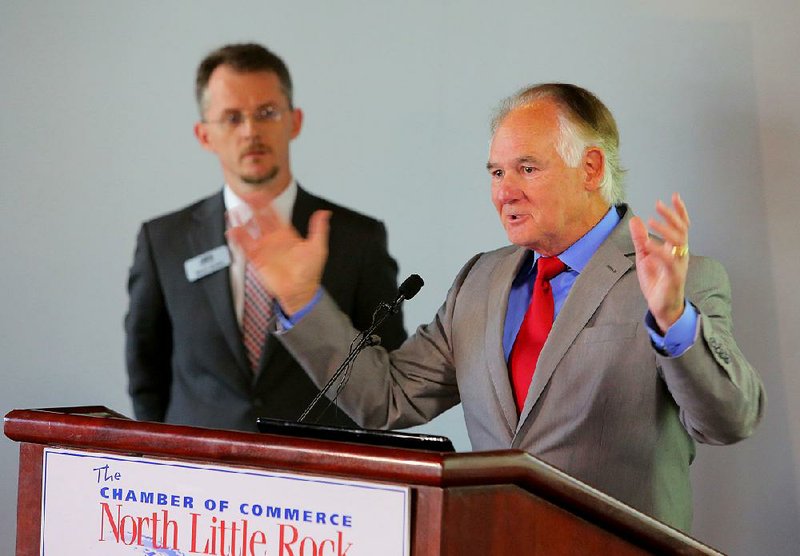 FILE – Terry Hartwick (right), president and CEO of the North Little Rock Chamber of Commerce, and Mitch Bettis announce the launch of the Arkansas Women’s Hall of Fame in North Little Rock in 2014. 