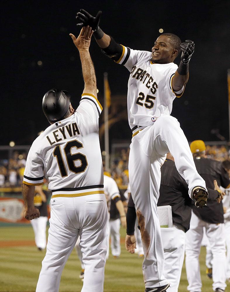 Mercer's hit in 11th lifts Pirates over Cardinals