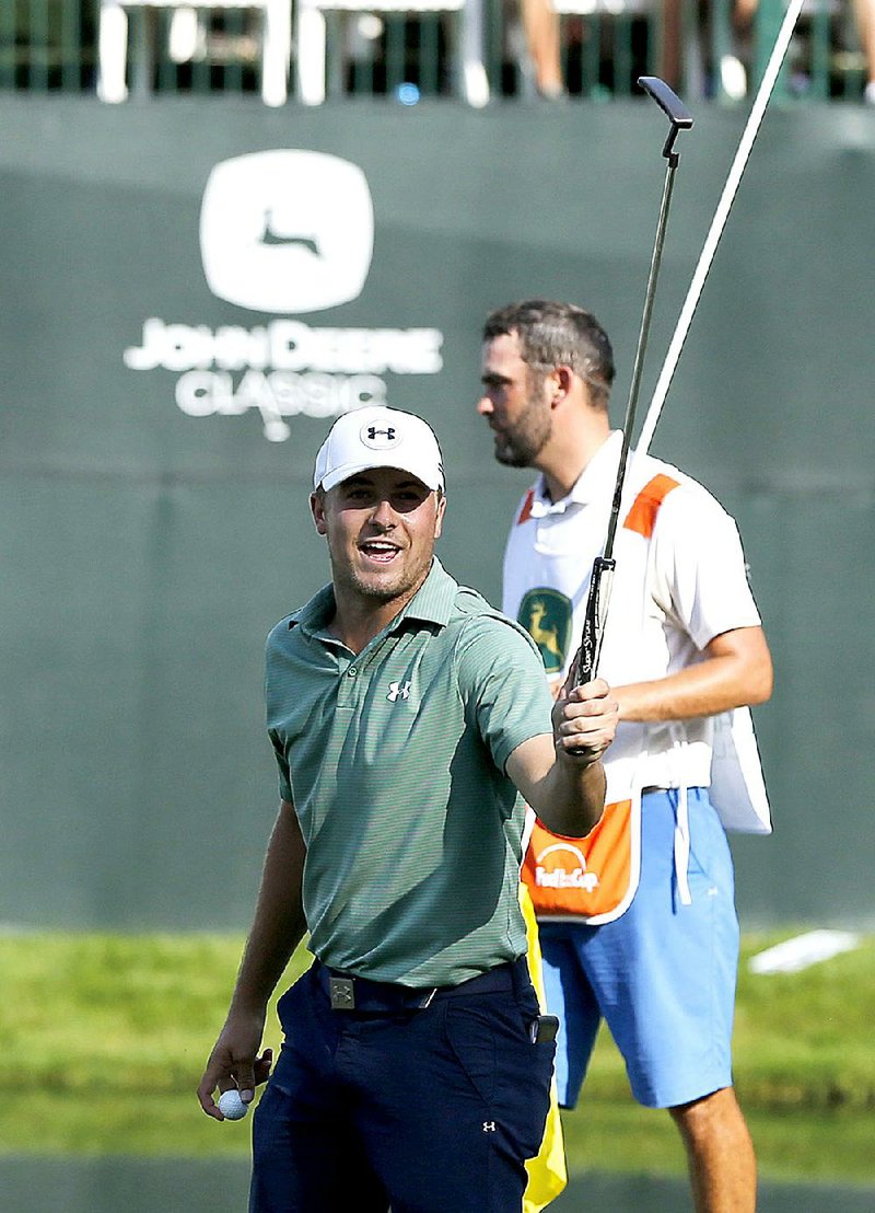 Jordan Spieth became the first golfer since Tiger Woods in 2000 to win four tournaments before the start of the British Open after he beat Tom Gillis on the second playoff hole Sunday at the John Deere Classic at TPC Deere Run in Silvis, Ill.