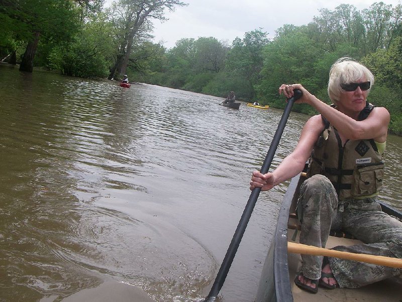 Debbie Doss plies Wattensaw Bayou in Prairie County during the opening of its Arkansas Water Trail in April 2009. Doss envisions a new paddling trail from the confluence of the Buffalo and White rivers to Arkansas City.