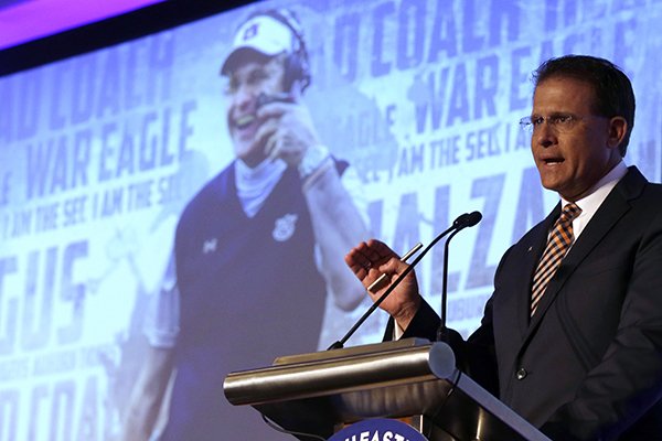 Auburn coach Gus Malzahn speaks to the media during the NCAA college football Southeastern Conference Media Days, Monday, July 13, 2015, in Hoover, Ala. (AP Photo/Butch Dill)