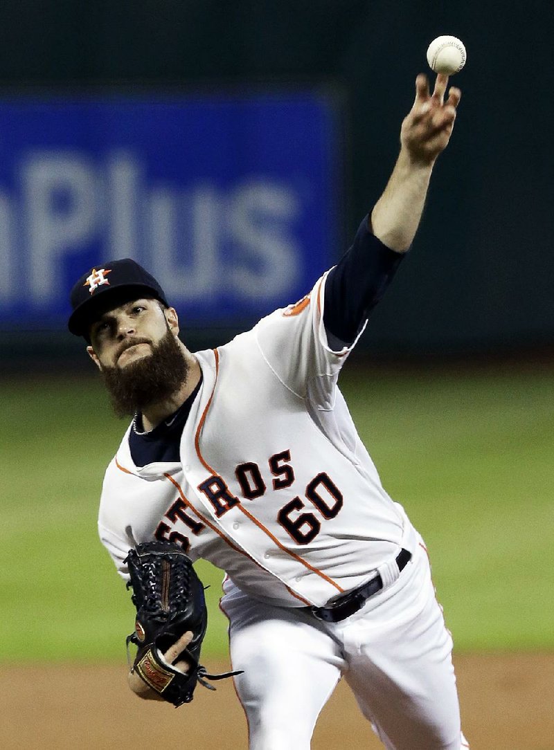 Dallas Keuchel pitches against the Kansas City Royals in this June 30 file photo.