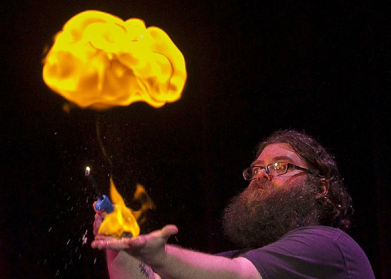 Kevin Delaney braves a fireball of hydrogen gas. The stunt was for Awesome Science, a presentation for school groups at Ron Robinson Theater in Little Rock.