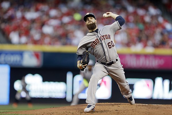 American League's Dallas Keuchel, of the Houston Astros, throws during the first inning of the MLB All-Star baseball game, Tuesday, July 14, 2015, in Cincinnati. (AP Photo/Jeff Roberson)