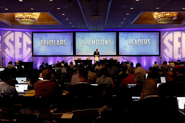 SEC Commissioner Greg Sankey speaks during the Southeastern Conference NCAA college football media days, Monday, July 13, 2015, in Hoover, Ala. (AP Photo/Butch Dill)