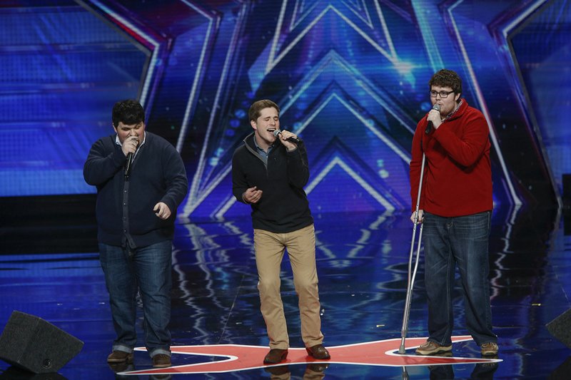 FILE — Triple Threat, featuring Ouachita grads Will Richey (left) and Tyler Davis (right) as well as Caleb Conrad, perform MKTO’s “Classic” on America’s Got Talent.