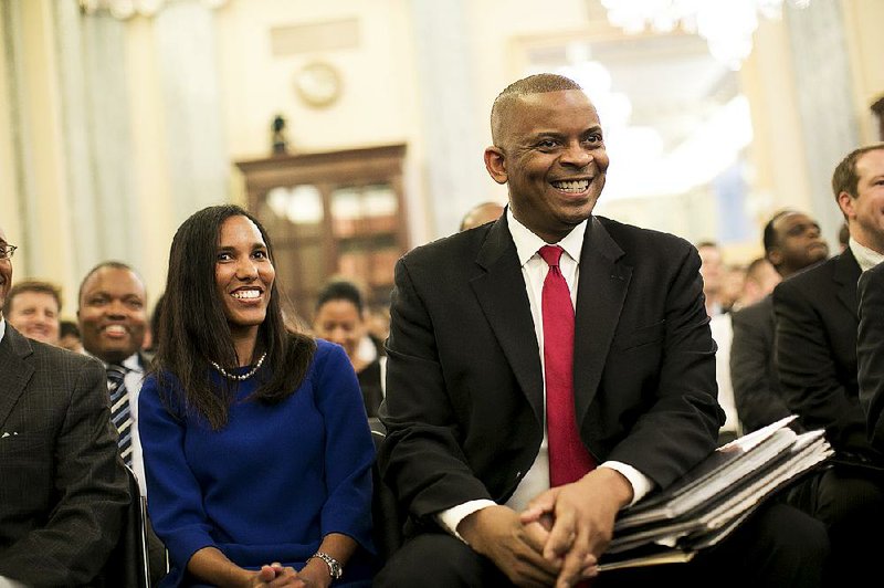 U.S. Transportation Secretary Anthony Foxx is shown with his wife Samara in this file photo from 2013.