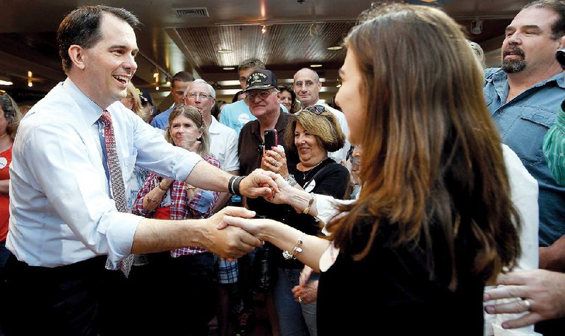 Scott Walker makes a campaign stop Thursday at Seacoast Harley-Davidson in North Hampton, N.H. 