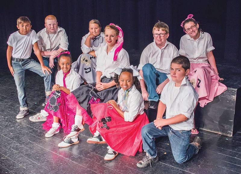 Among the students appearing in the upcoming production of Mutt-i-grees Musical Extravaganza: The Dog Days of Summer 2015 at Clinton High School are, front row, from left, Lilyann Barnes, Eva Barnes and Jeremyah Green; and back row, Joseph Strawn, Levi Thomas, Keegan Campbell, Alyssa McKnight, Garison Robbins and Jaiden Green.