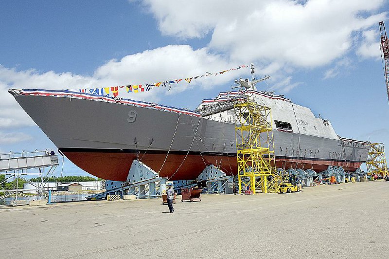 The future USS Little Rock awaits today’s launch into the Menominee River at Marinette Marine Shipyard in Marinette, Wis. More photos are available at arkansasonline.com/galleries.