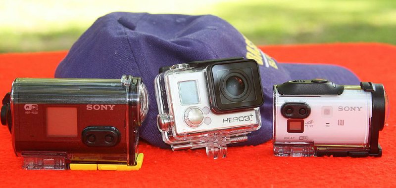 Compact action cameras like the Sony HDR-AS20 (from left), the GoPro Hero and the Sony HDR-AZ1VR add new dimensions to hunting and fishing videography. Each comes with a waterproof case.