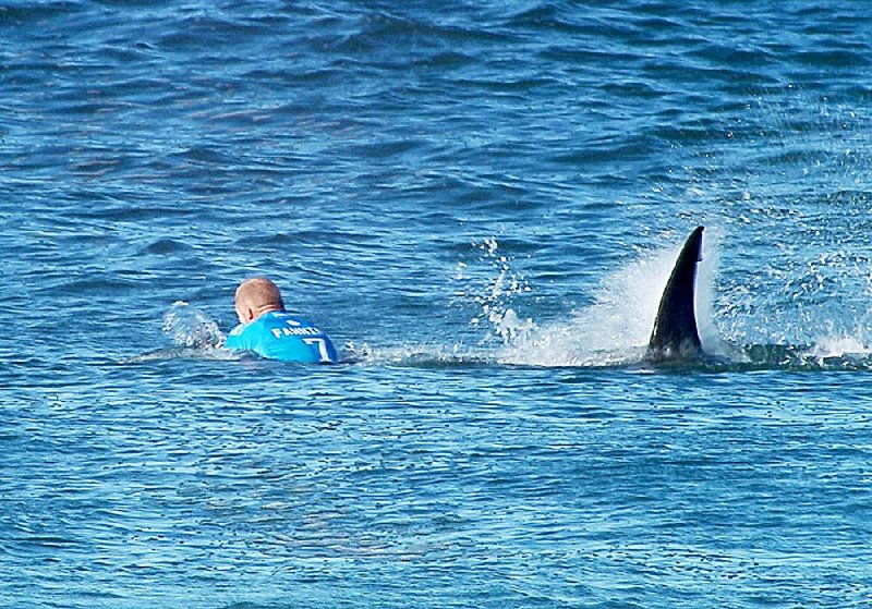 Australian surfer Mick Fanning fought off a shark attack and came away unharmed Sunday at a World Surf League event at Jeffreys Bay off the Eastern Cape province of South Africa. More information is available at worldsurfleague.com.