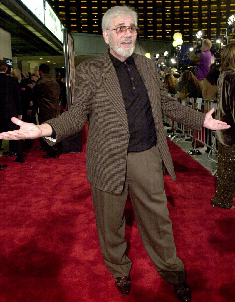 Alex Rocco chats with photographers before the premiere of "The Wedding Planner" in Los Angeles in this January 2001 file photo. Rocco, a gravelly voiced character actor likely best known as Moe Greene in "The Godfather," died Saturday at age 79.