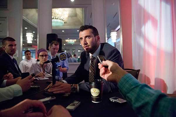 Arkansas' Brandon Allen speaks to reporters at the Southeastern Conference NCAA college football media days, Wednesday, July 15, 2015, in Hoover, Ala. (AP Photo/Brynn Anderson)
