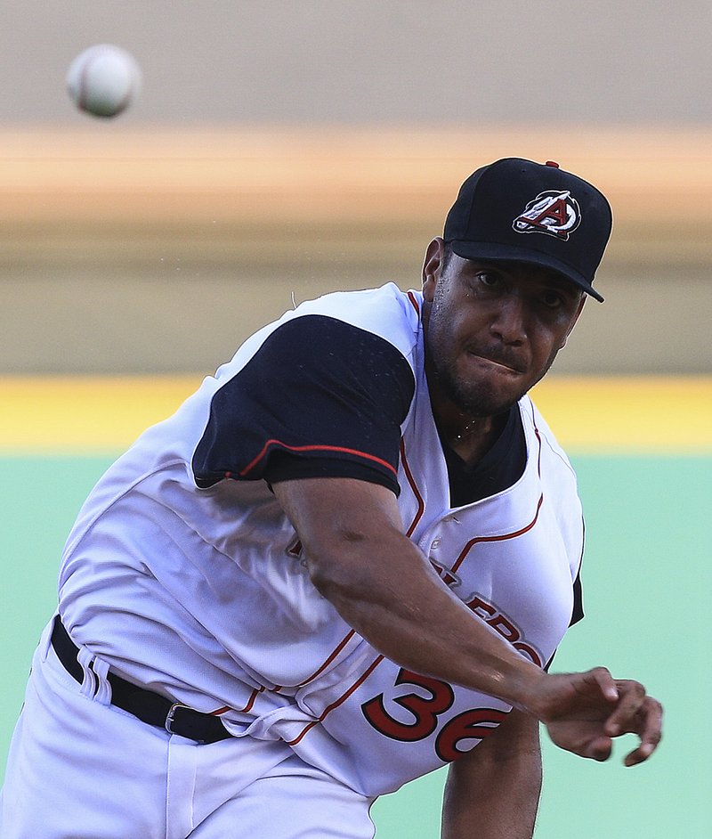 Arkansas Travelers starter Albert Suarez delivers a pitch during Tuesday night’s game against the Springfield Cardinals at Dickey-Stephens Park in North Little Rock. Suarez allowed 3 runs on 7 hits with 5 strikeouts in 5 innings.