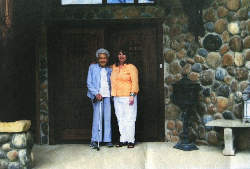 Photograph submitted Many years later, Betty Jeane Corkins stands with Lynn Mosby on the porch of Ginger Blue Inn, a bed and breakfast that pays tribute to the original resort.