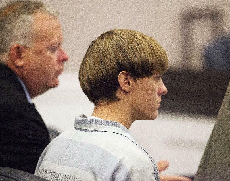 Dylan Roof, appearing in court July 16 in Charleston, S.C., was indicted Wednesday on federal charges including hate crimes, in the killing of nine people at a church in Charleston. 
