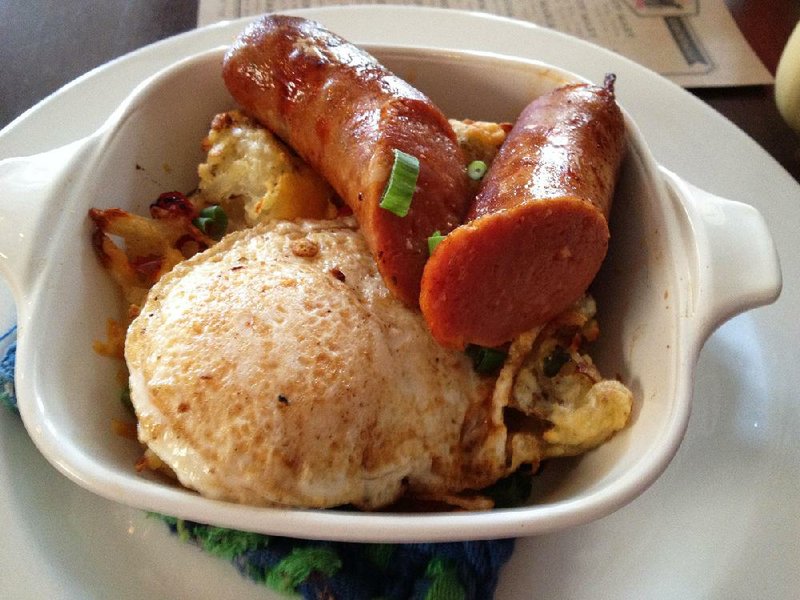 Andouille sausage and an egg come over a hashbrown casserole at South on Main. 