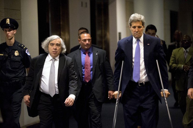 Energy Secretary Ernest Moniz (left) and Secretary of State John Kerry arrive Wednesday on Capitol Hill for classified briefings with congressmen on the Iran nuclear deal.