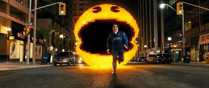 Video game ace Ludlow (Josh Gad) is chased by Pac-Man in Chris Columbus’ "Pixels."