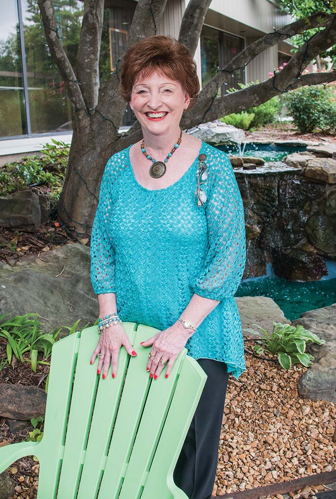 Wilba Thompson stands in front of the Fairfield Bay Conference and Visitor Center, which underwent a major renovation in 2013 after being closed for 11 years. Thompson, a native of Searcy, is co-director of the center, along with her husband.