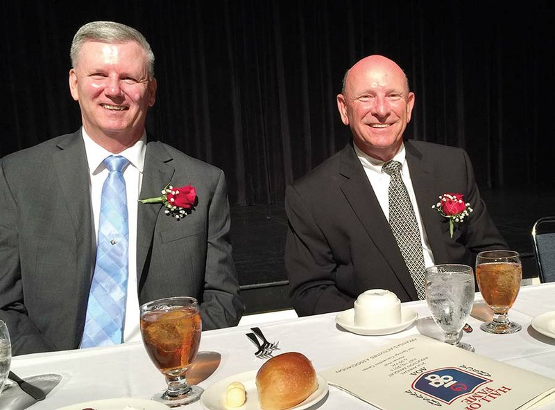 Jim Pennington, left, and Tommy Reed are two of the coaches inducted into the Arkansas High School Coaches Association Hall of Fame on July 10 in Hot Springs.  