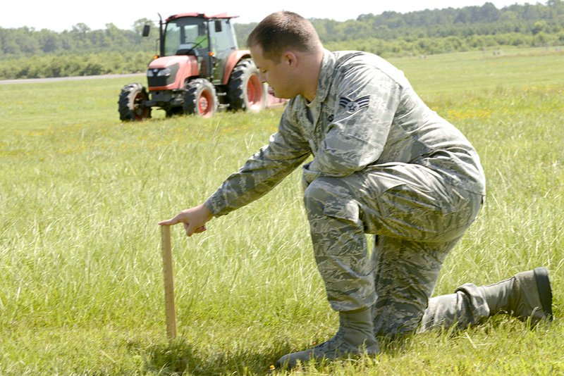 Senior Airman Jordy Lamb, 19th Operations Support Squadron Airfield Management journeyman, ensures that airfield grass is between 7 and 14 inches high as part of the Bird/wildlife Aircraft Strike Hazard (BASH) plan to keep birds and wildlife from the airfield.