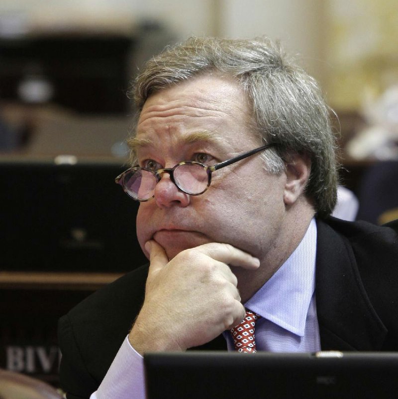 Sen. Keith Ingram, D-West Memphis, watches proceedings in the House chamber at the Arkansas state Capitol in this file photo from 2011. 