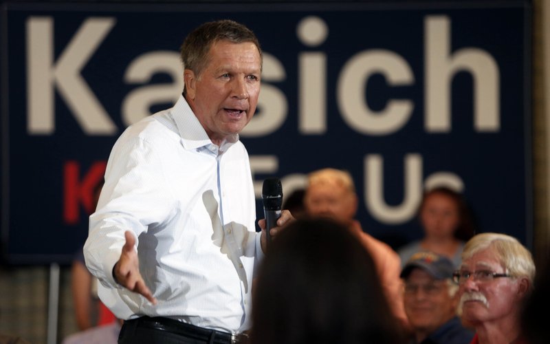 Republican presidential candidate Gov. John Kasich speaks at a town hall style meeting Tuesday in Nashua, N.H.