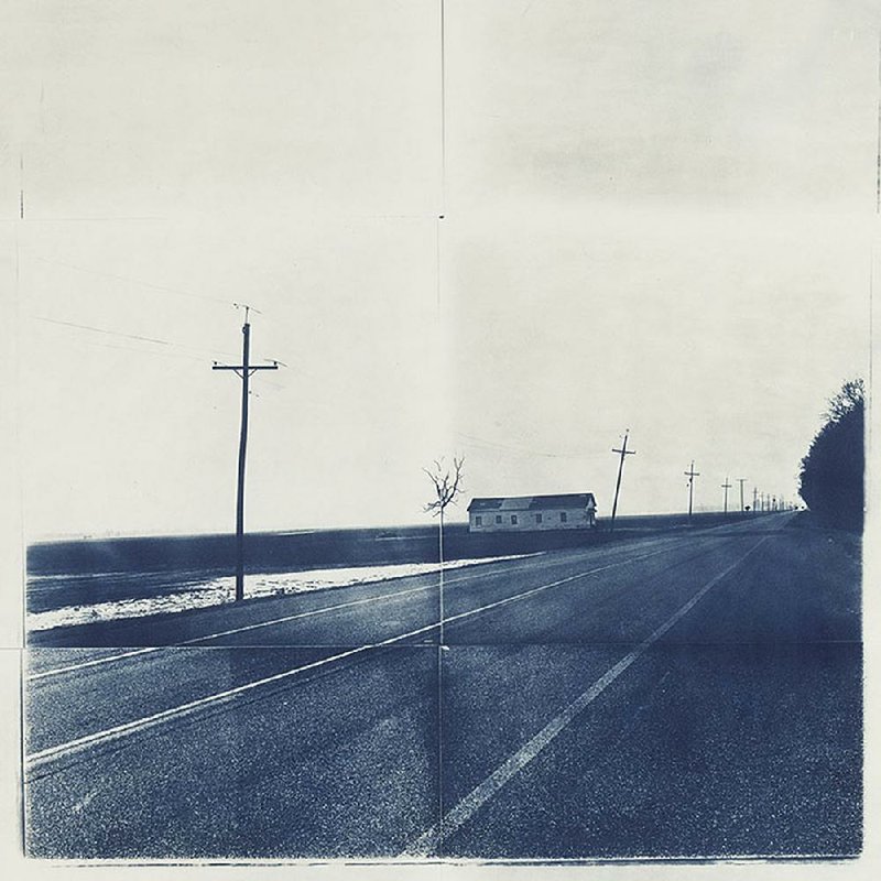 Hot Springs artist Beverly S. Buys’ Lonesome Highway, a cyanotype, hangs as part of the Delta Exhibition at the Arkansas Arts Center. 
