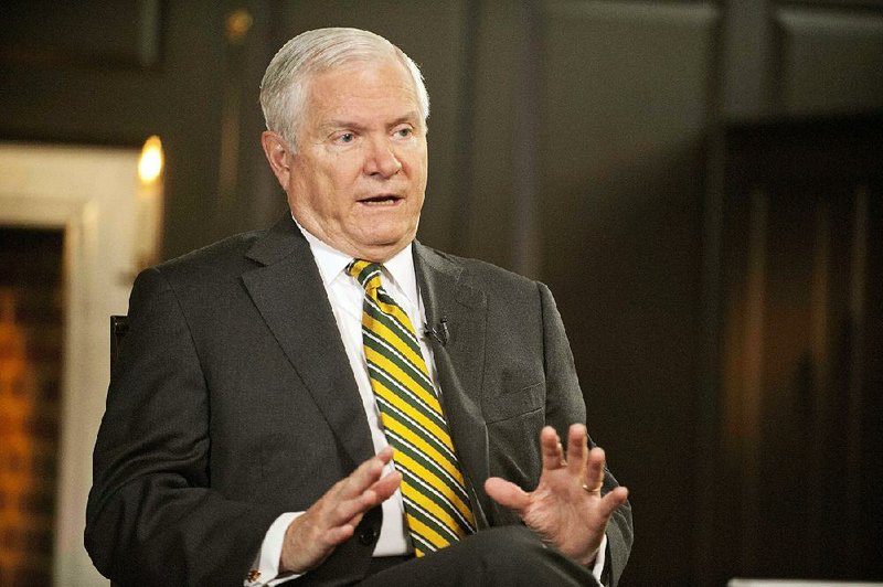 Former Defense Secretary Robert Gates talks with CBS's "Face the Nation" in this May 2013 file photo.