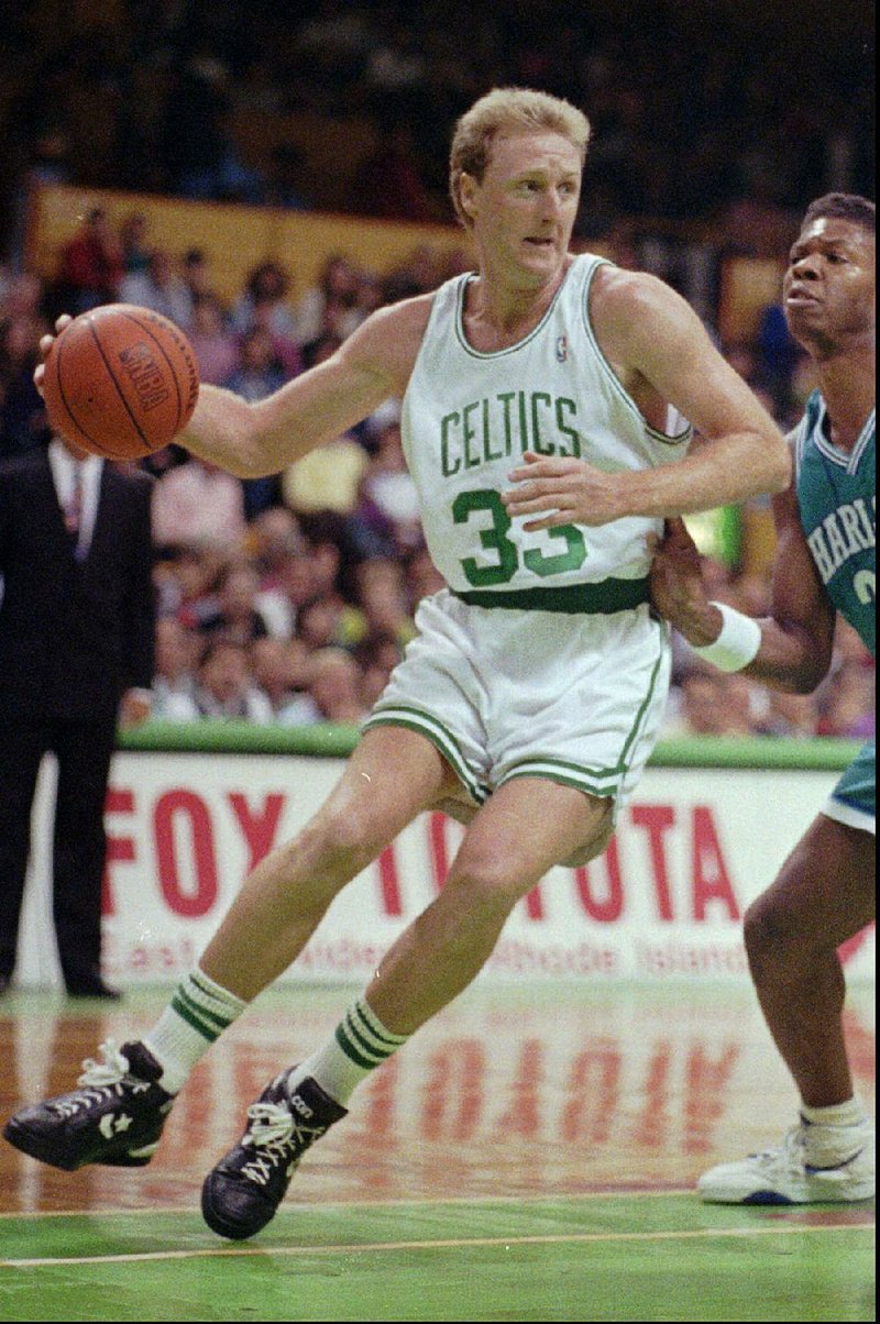 Former Boston Celtics great Larry Bird, shown here in a November 1991 file photo, said in a phone interview Monday that he cannot compete against former Dream Team teammate Michael Jordan.