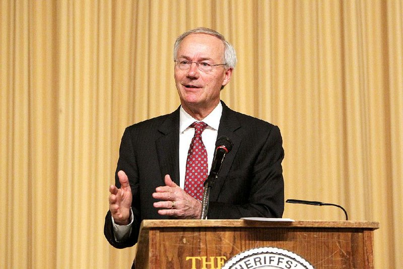 Gov. Asa Hutchinson speaks to the Arkansas Sheriffs’ Association at the Arlington Hotel & Spa in Hot Springs in this file photo.