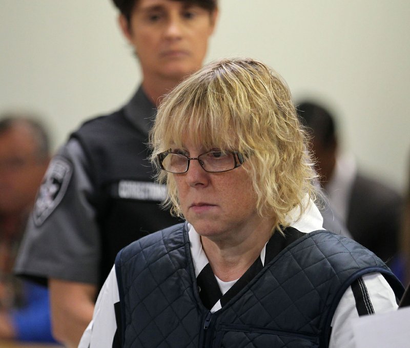 FILE - In this June 15, 2015, file photo, Joyce Mitchell appears before Judge Mark Rogers in Plattsburgh, N.Y., City Court for a hearing. 